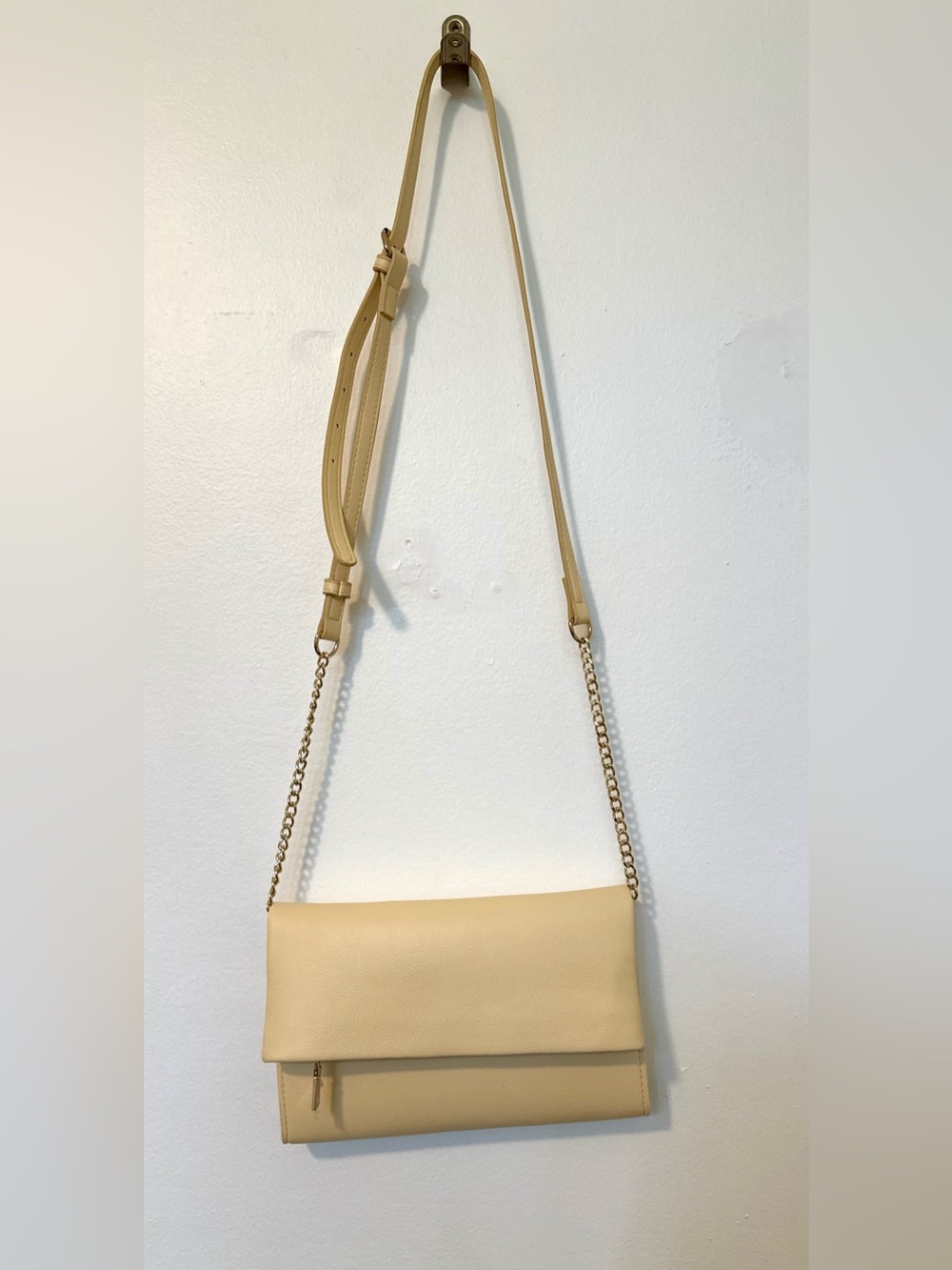 INC  Light Yellow Leather Crossbody with Gold Chain and gold accents.